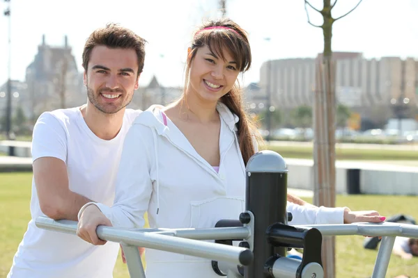 Couple doing sport outdoors — Stock Photo, Image