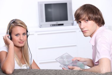 Teenagers listening to music clipart