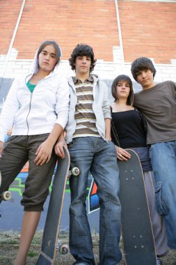 Teenagers with skateboards clipart
