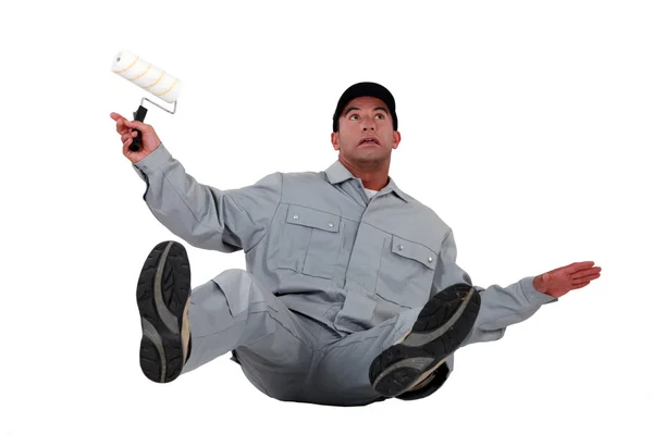 Artigiano pittore scivolando e cadendo — Foto Stock