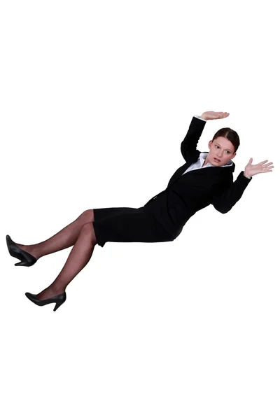 Mulher de negócios caindo para trás — Fotografia de Stock
