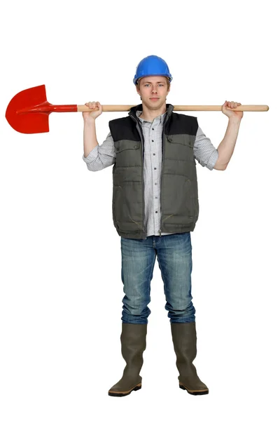 Bricklayer holding shovel — Stock Photo, Image