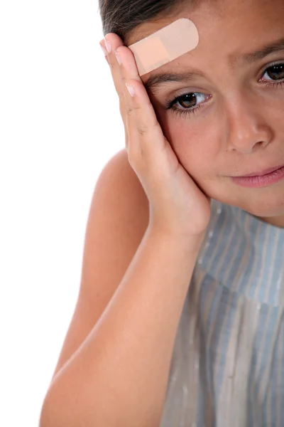 stock image Child with pain in the forehead