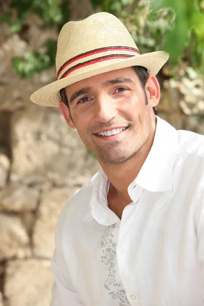 Summery man in a straw hat — Stock Photo, Image