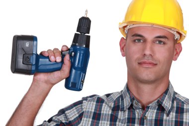 Artisan with drill clipart