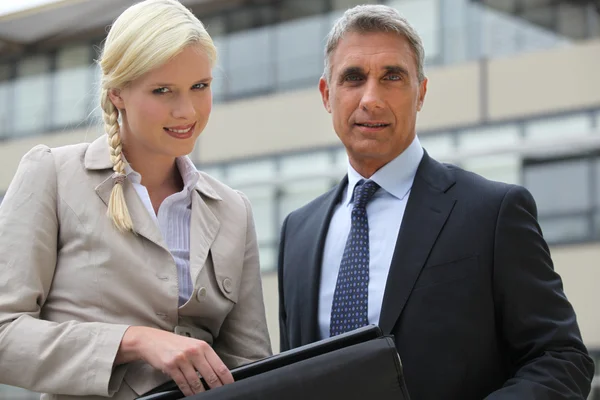 Director and secretary outdoors — Stock Photo, Image