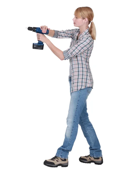 Female DIY fan holding power drill — Stock Photo, Image