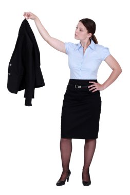 Woman with jacket in hand clipart