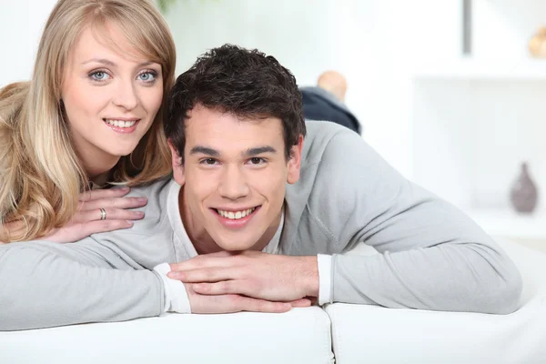 Cute couple relaxing at home — Stock Photo, Image