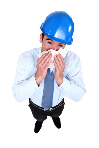 Architect blowing his nose — Stock Photo, Image