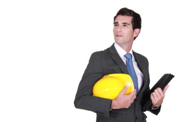 Man in a suit and helmet with folder clipart