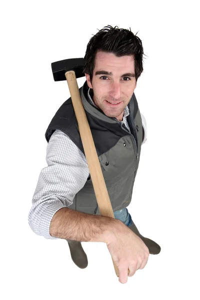 Man carrying sledge-hammer — Stock Photo, Image