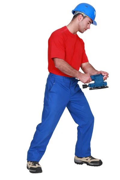 Craftsman holding a tool — Stock Photo, Image