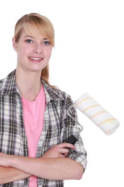 Blond woman stood with paint roller — Stock Photo, Image