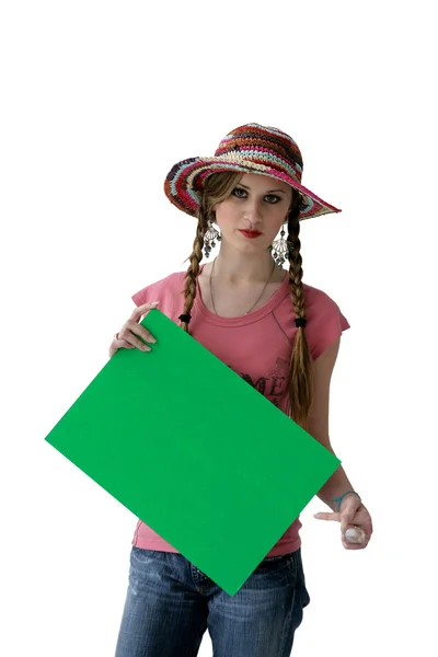Frau mit Hut zeigt auf grünes Plakat — Stockfoto