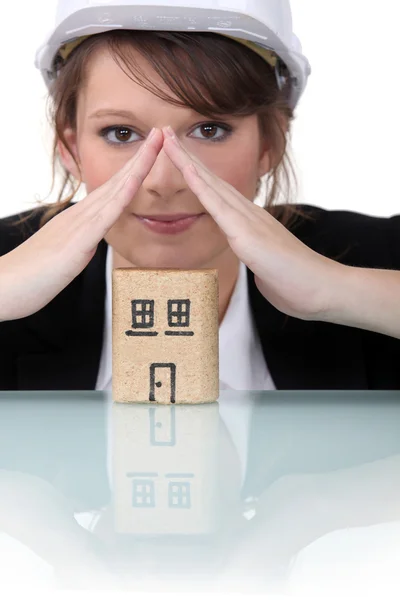 Woman making a roof shape with hands — Stock Photo, Image