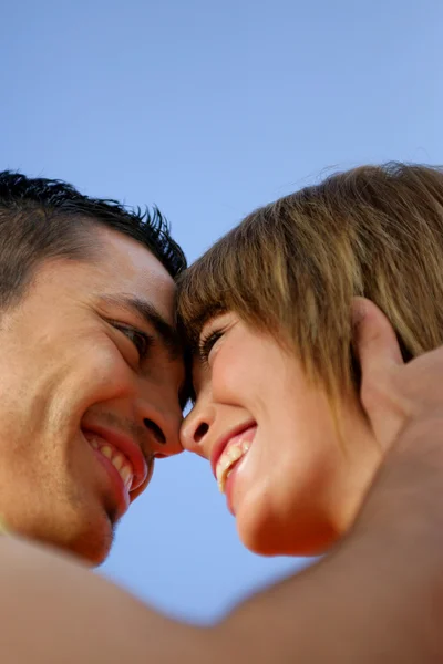 Affectionate couple stood outdoors — Stock Photo, Image