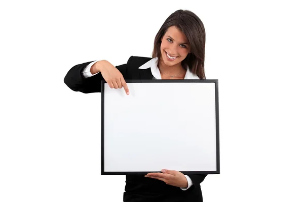 Portrait of a woman holding a frame — Stock Photo, Image