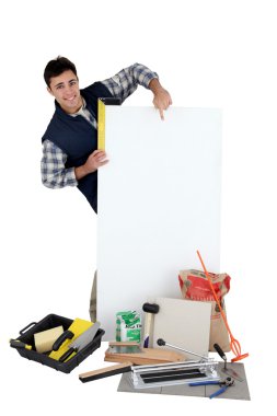 Tiles pointing to advertising panel clipart