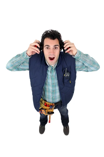 Builder with ear muffs — Stock Photo, Image