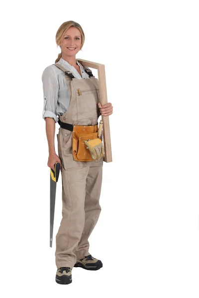 Woman with saw — Stock Photo, Image