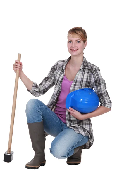 Woman with a sledgehammer — Stock Photo, Image