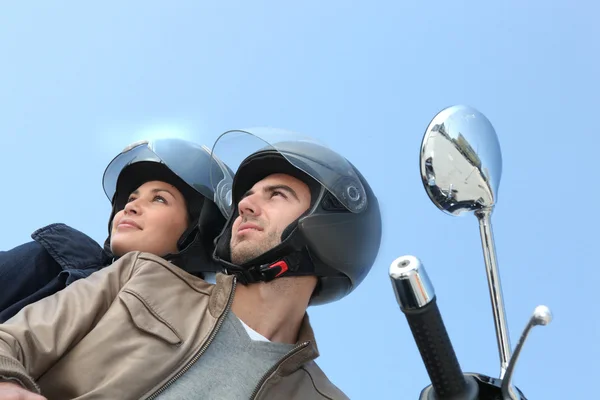 Couple riding a motorcycle — Stock Photo, Image