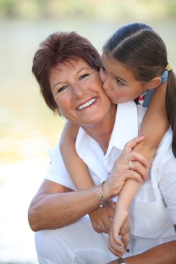 Grandmother and granddaughter clipart