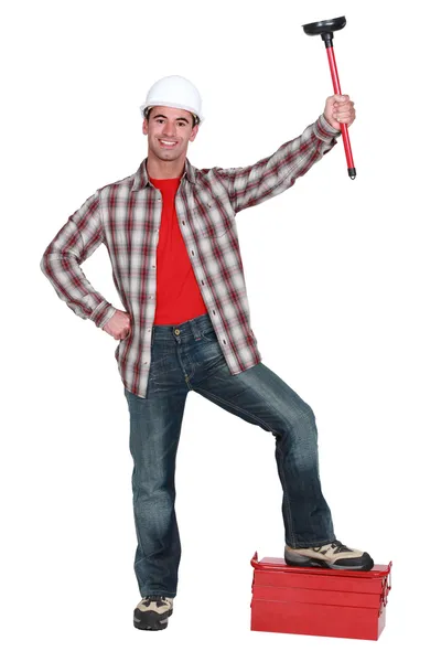 Man with a plunger — Stock Photo, Image