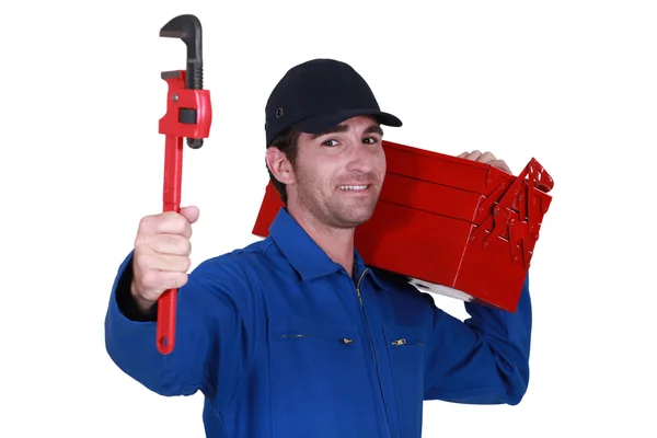 Arbeiter mit Werkzeugkiste und Schraubenschlüssel — Stockfoto