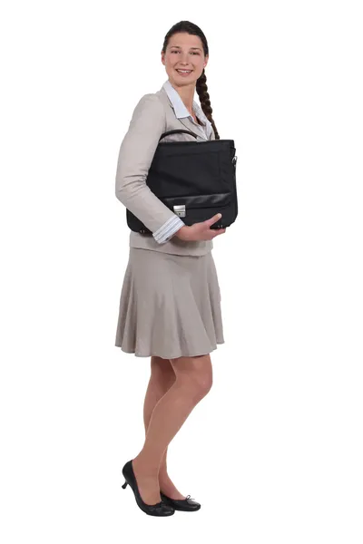 Mujer de negocios sosteniendo un maletín —  Fotos de Stock