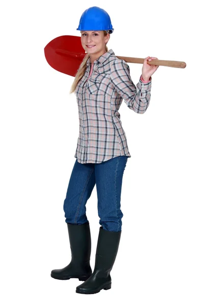 Labourer holding a spade — Stock Photo, Image