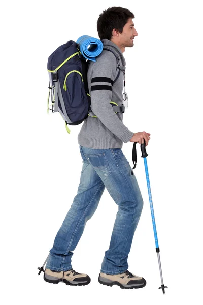 A man ready for backpacking in mountains — Stock Photo, Image