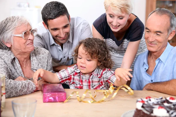Parents and grandparents with a boy on his birthday — Stock Photo, Image