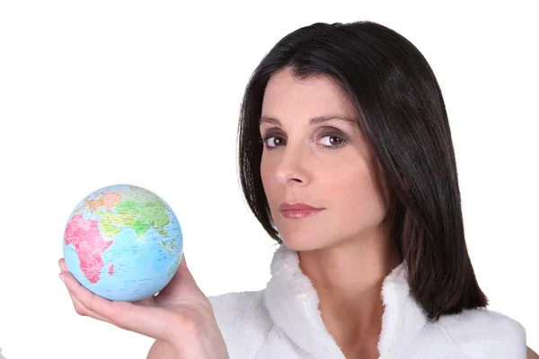 Woman with globe in hand — Stock Photo, Image