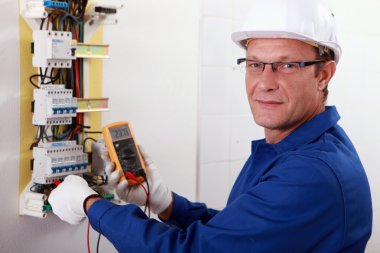 Portrait of an electrician clipart