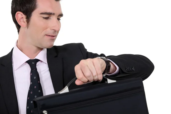 Businessman checking he is not late — Stock Photo, Image