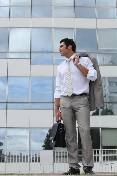 Man standing outside with his briefcase — Stock Photo, Image