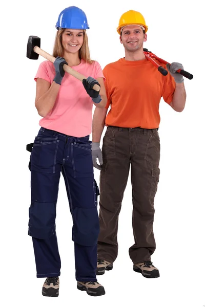 Hantverkare och hantverkerska poserar tillsammans — Stockfoto