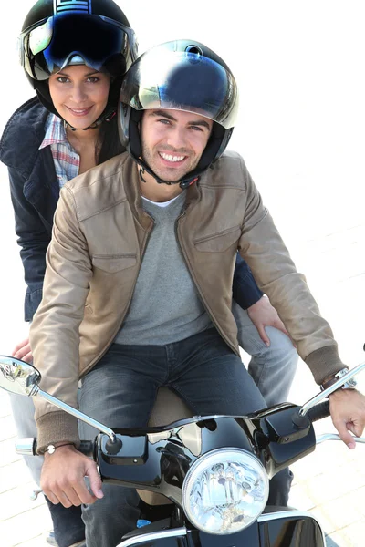 Riding a scooter together — Stock Photo, Image