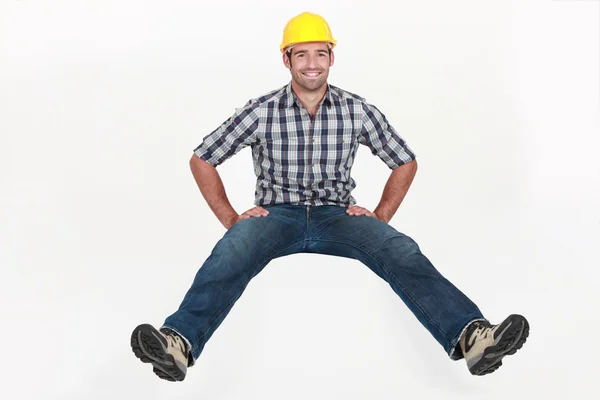 Craftsman sitting in the air — Stock Photo, Image