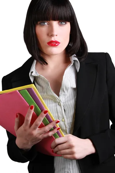 Attractive businesswoman carrying files — Stock Photo, Image