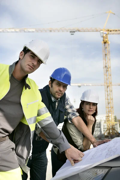 Workteam on construction site Royalty Free Stock Images