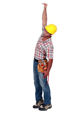 Construction worker hanging in empty space clipart