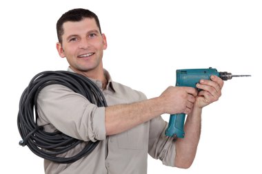 Man with cable and drill clipart