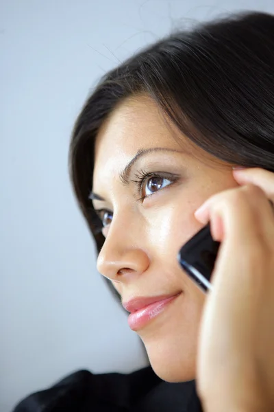 Close-up of women on her mobile — Stock Photo, Image