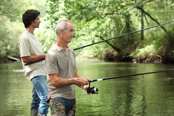 Père et fils pêche — Photo