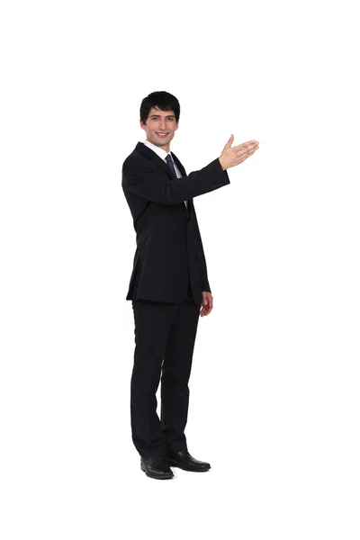 A businessman showing directions. — Stock Photo, Image