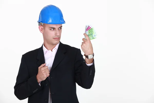 Foreman with bank notes in hand — Stock Photo, Image