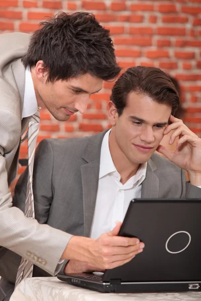 Men connecting to network — Stock Photo, Image
